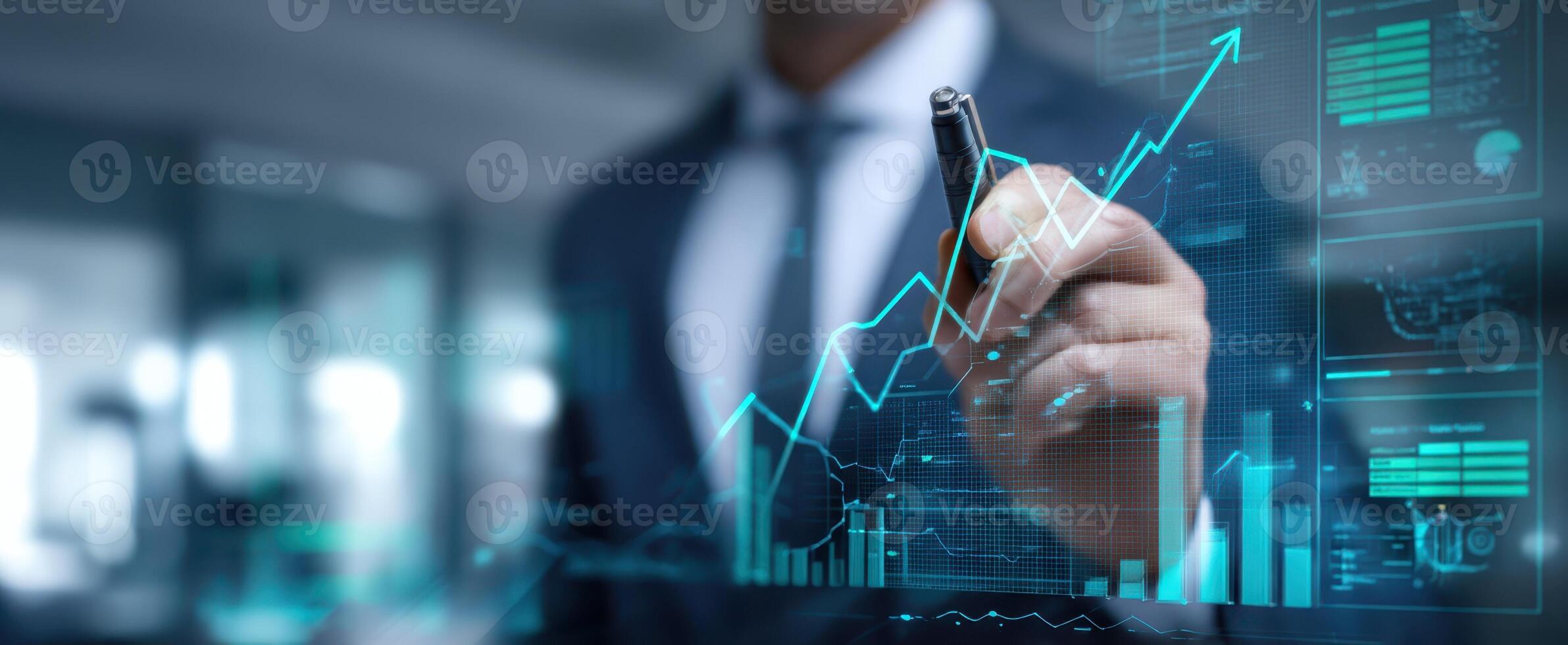 The businessman analyzing financial data and trends with digital graphs. photo