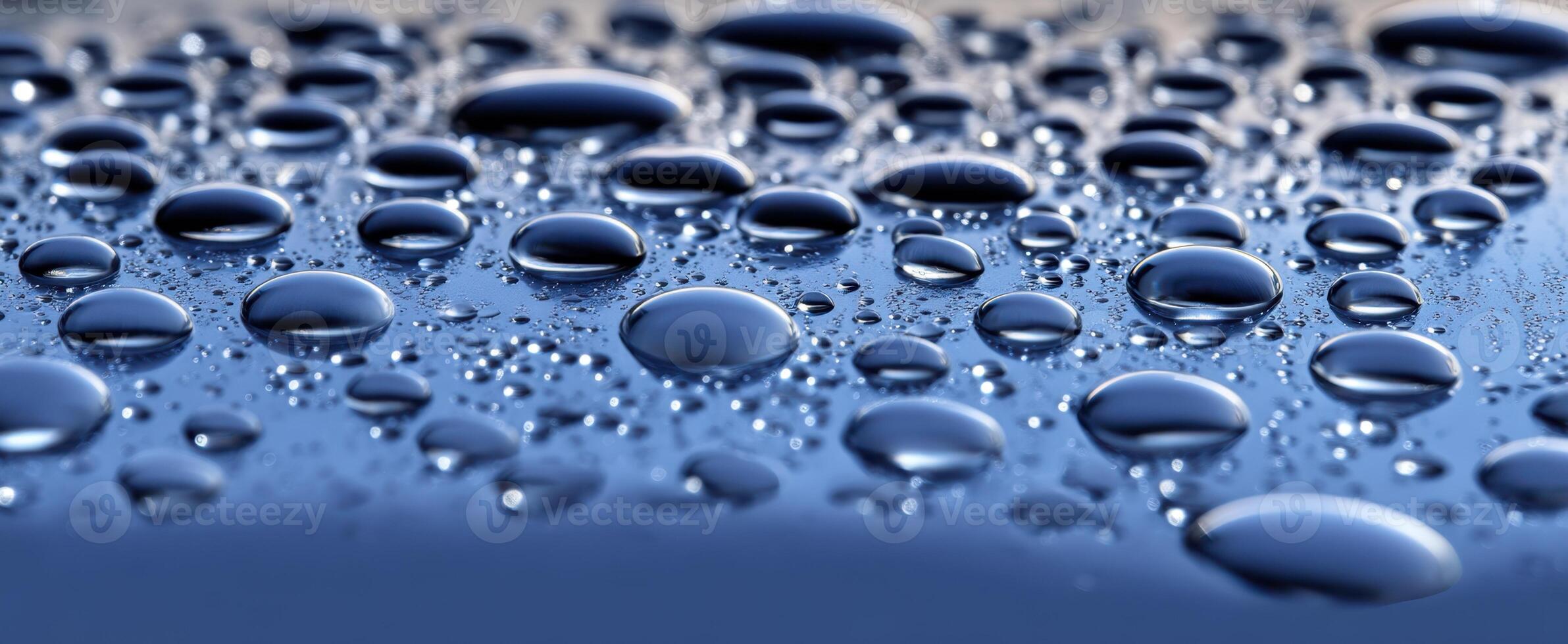 The Close-Up View of Water Droplets on a Blue Surface photo