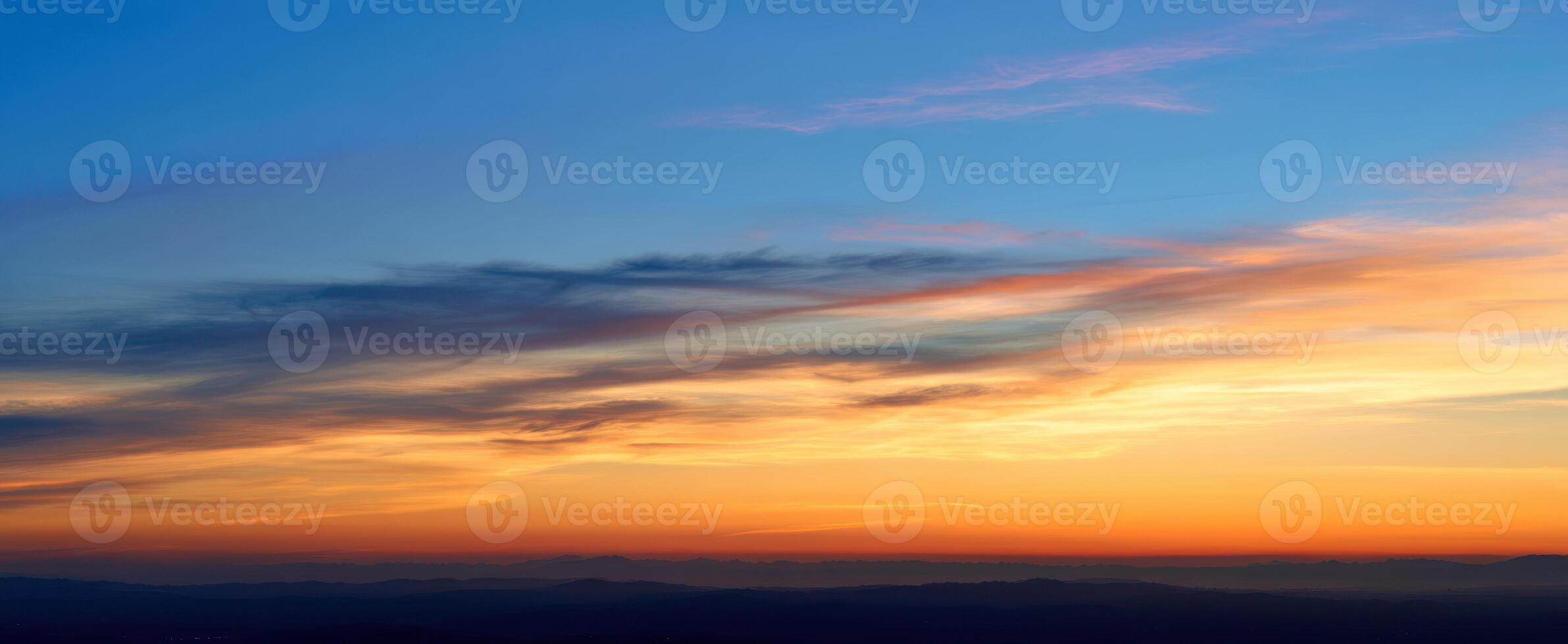 The breathtaking sunset painting the horizon with vibrant colors and tranquility. photo