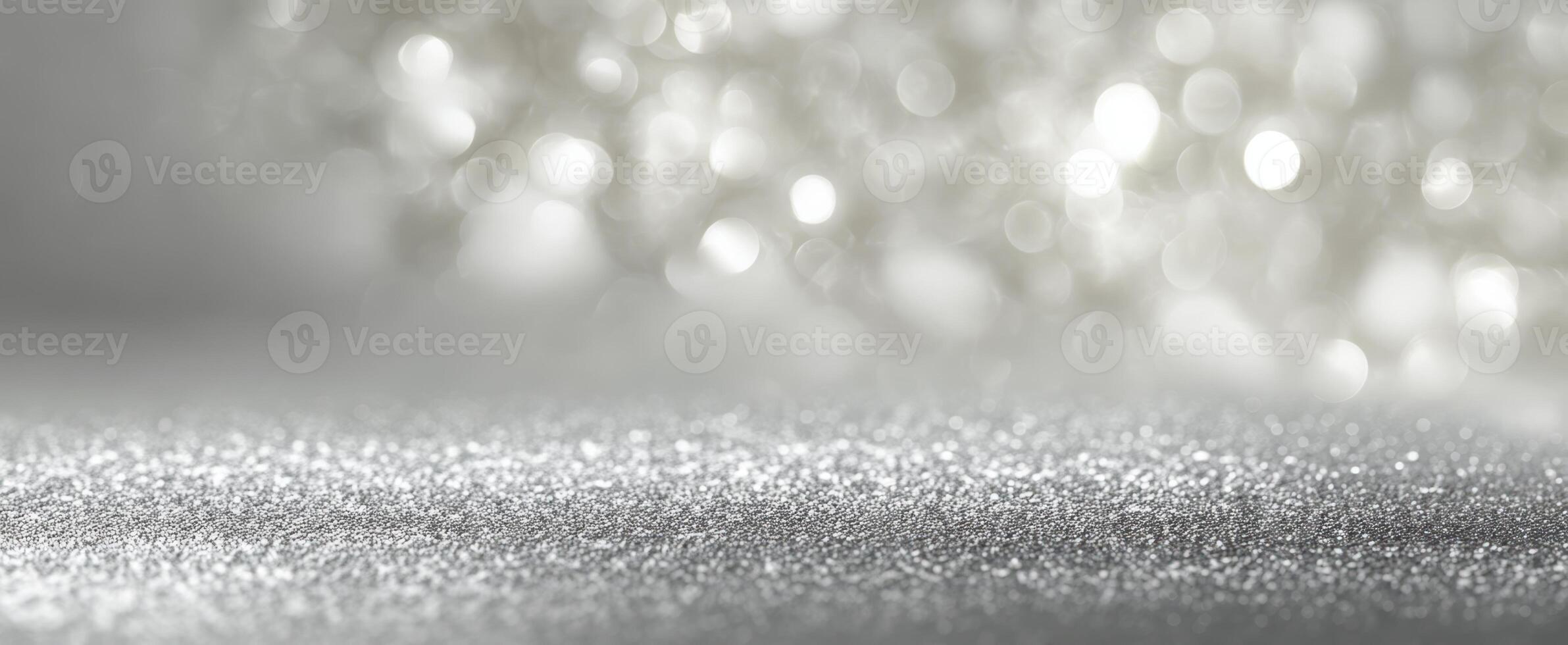 The shimmering silver glitter background with soft bokeh lights and elegance. photo