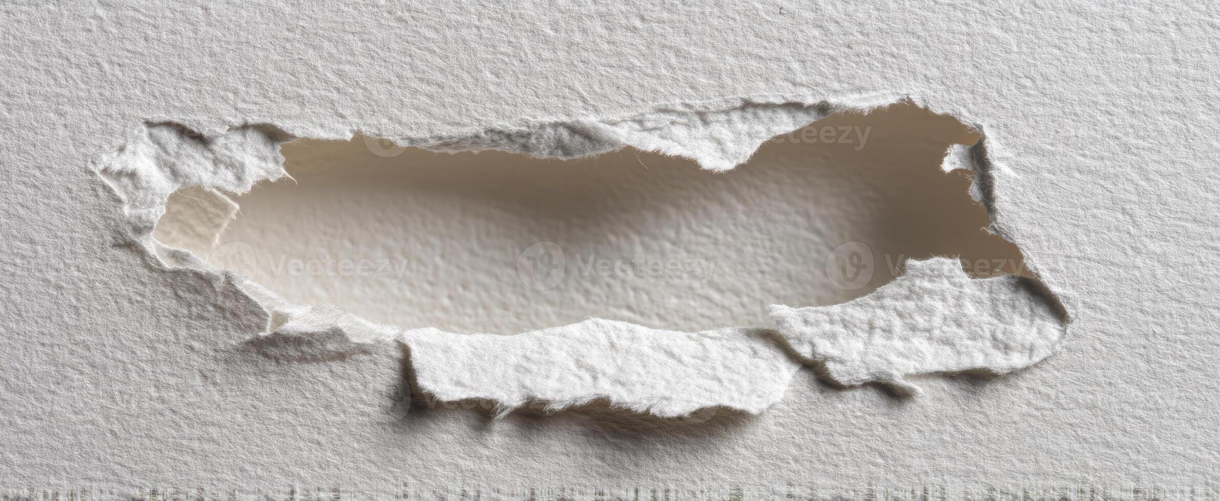 The Torn Paper Creating an Intriguing Spotlight on the Background photo
