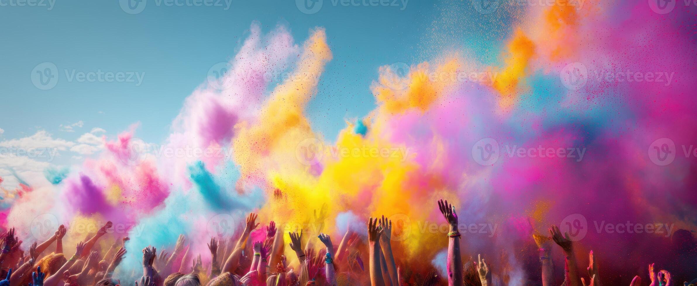 The vibrant celebration of color during a joyful outdoor festival. photo