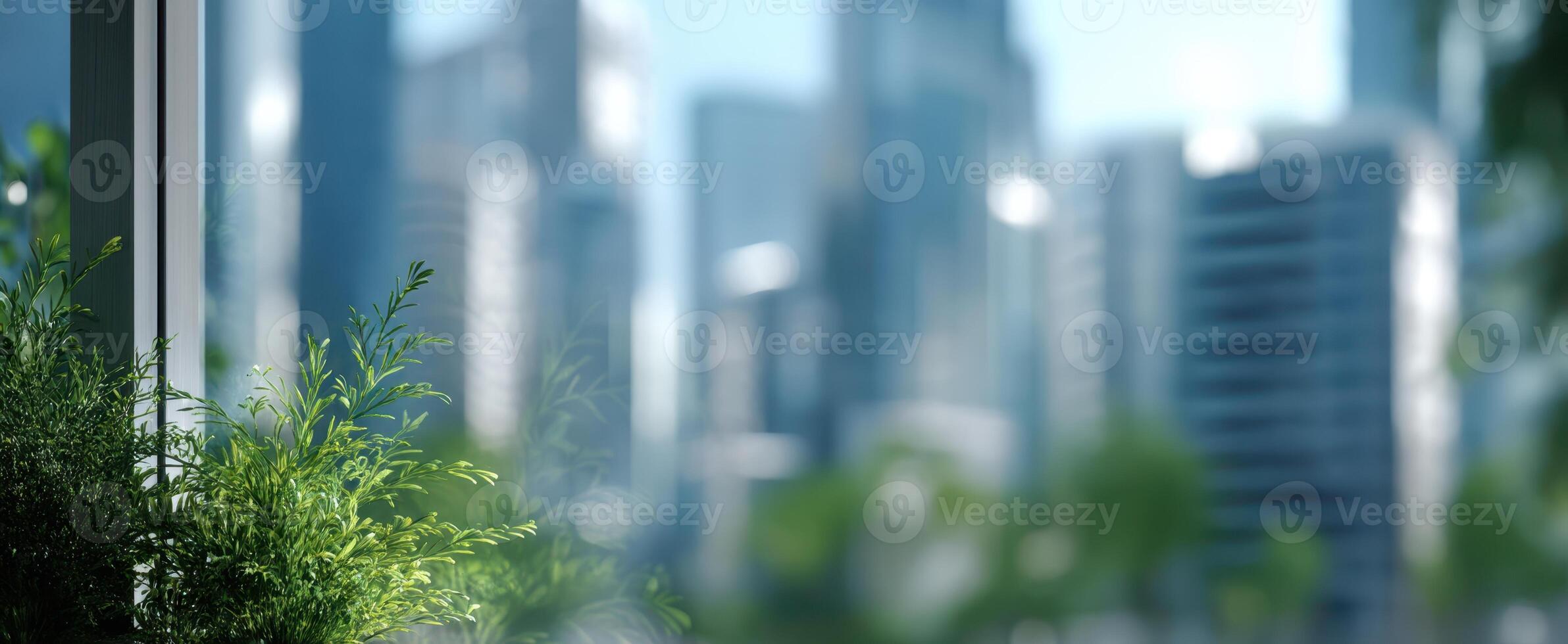 The serene greenery beside a modern cityscape in a bright urban environment. photo