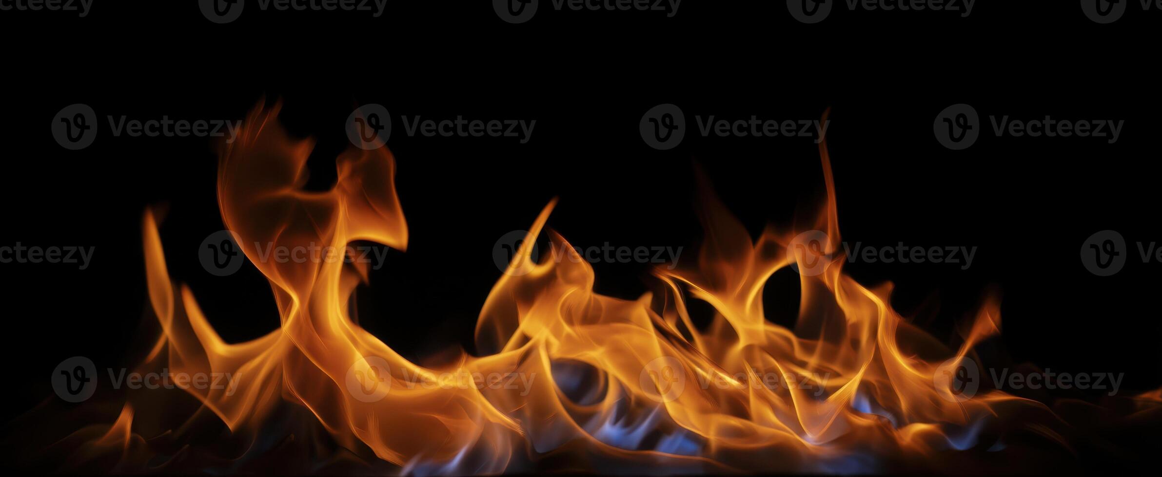 The captivating beauty of flames dancing against a black background photo