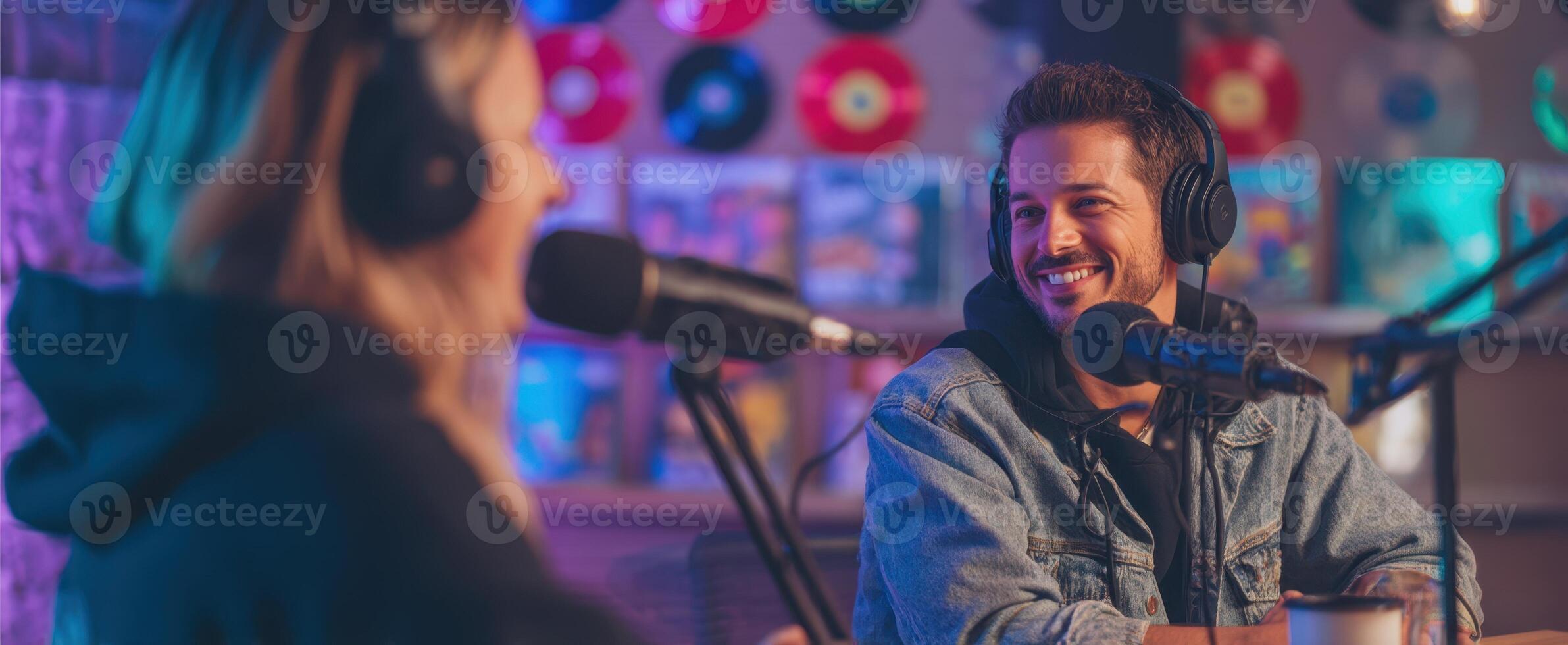 The engaging conversation between podcast hosts in a vibrant recording studio. photo