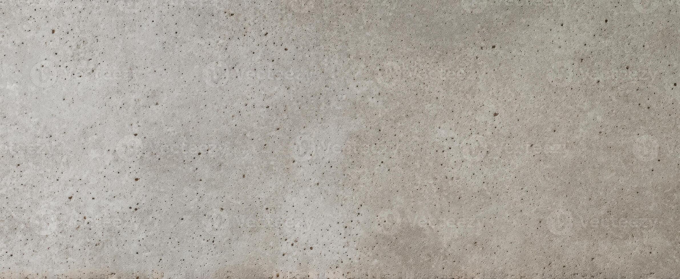The textured concrete surface showcasing a minimalist and industrial aesthetic. photo