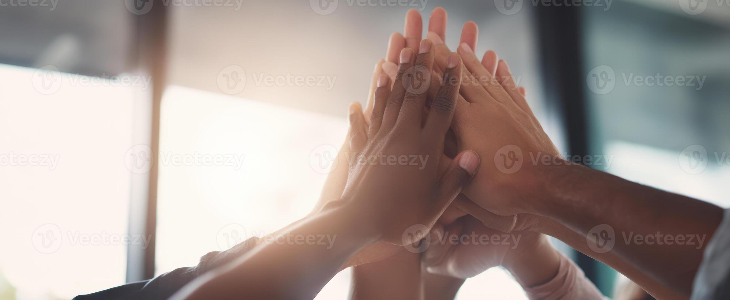 The Hands of Unity Celebrating Teamwork and Collaboration in a Business Setting photo