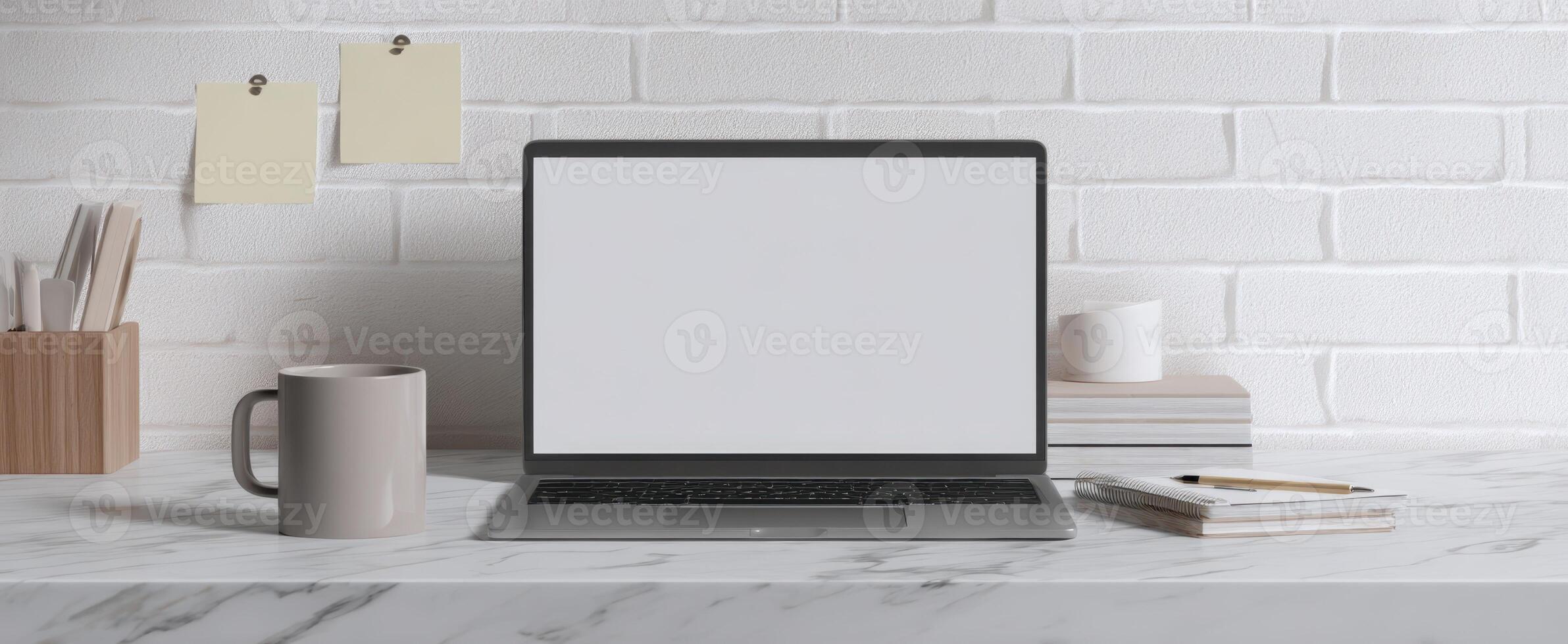The modern workspace with laptop and coffee mug on a stylish desk. photo