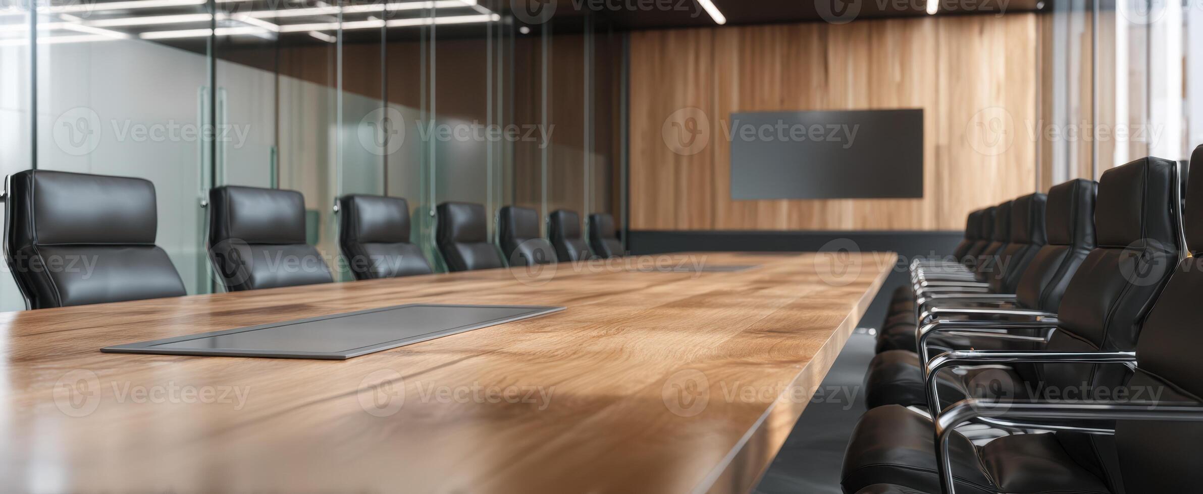 The modern conference table set in an elegant corporate boardroom environment. photo