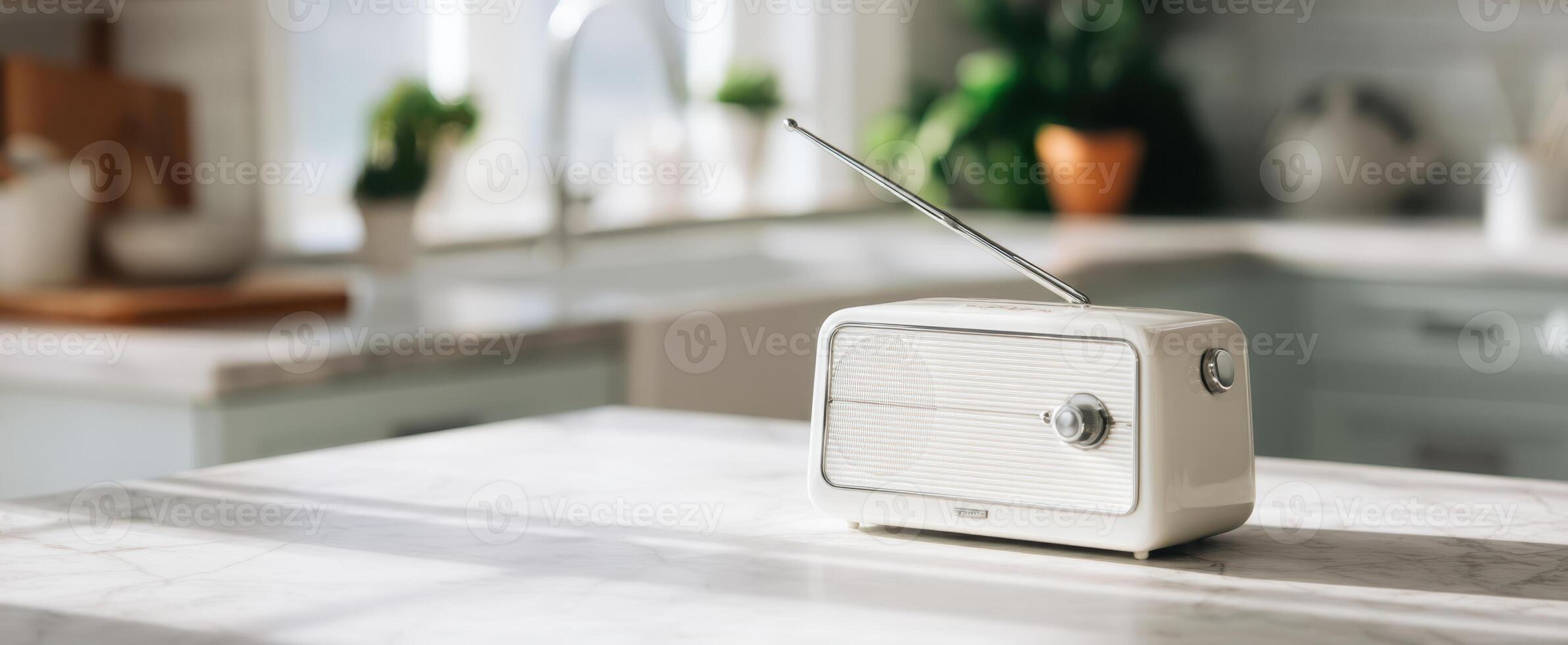 The vintage radio sitting elegantly on a modern kitchen countertop. photo