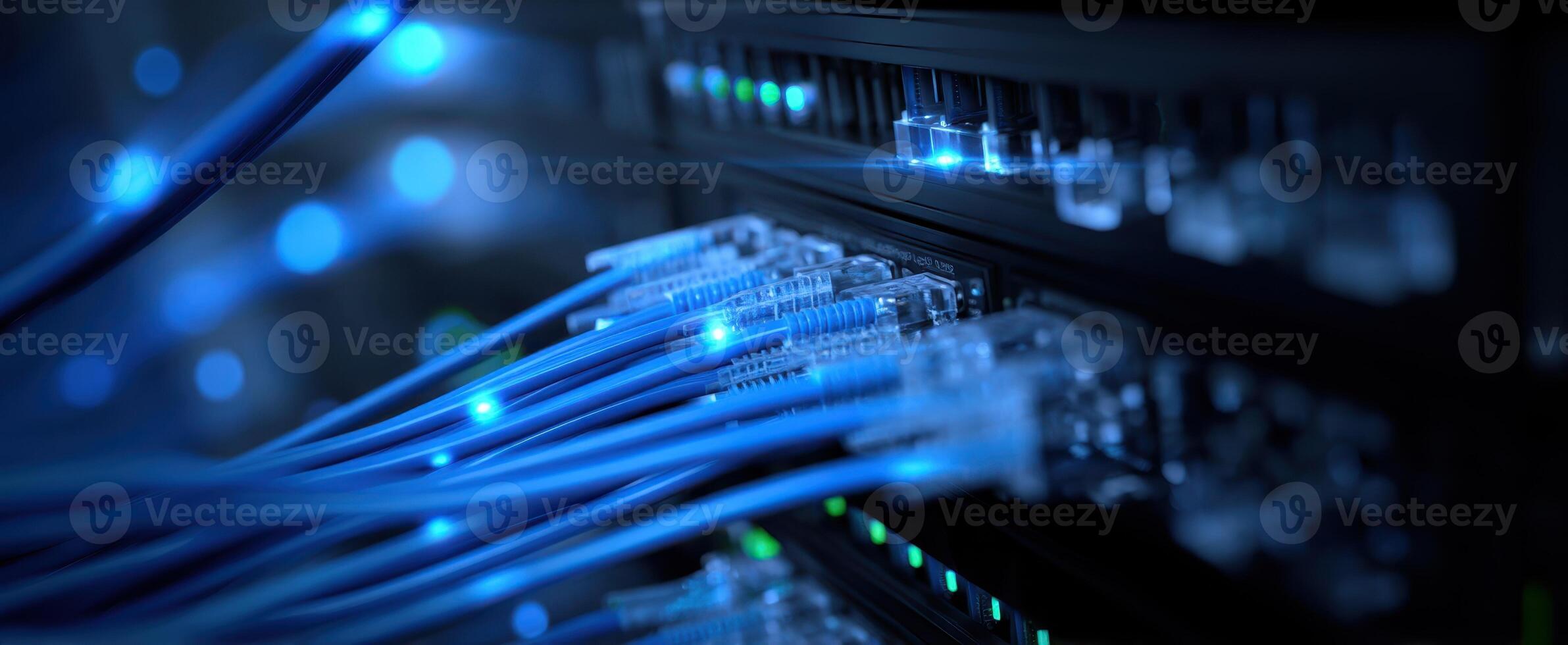 The modern data center with illuminated blue network cables and servers. photo