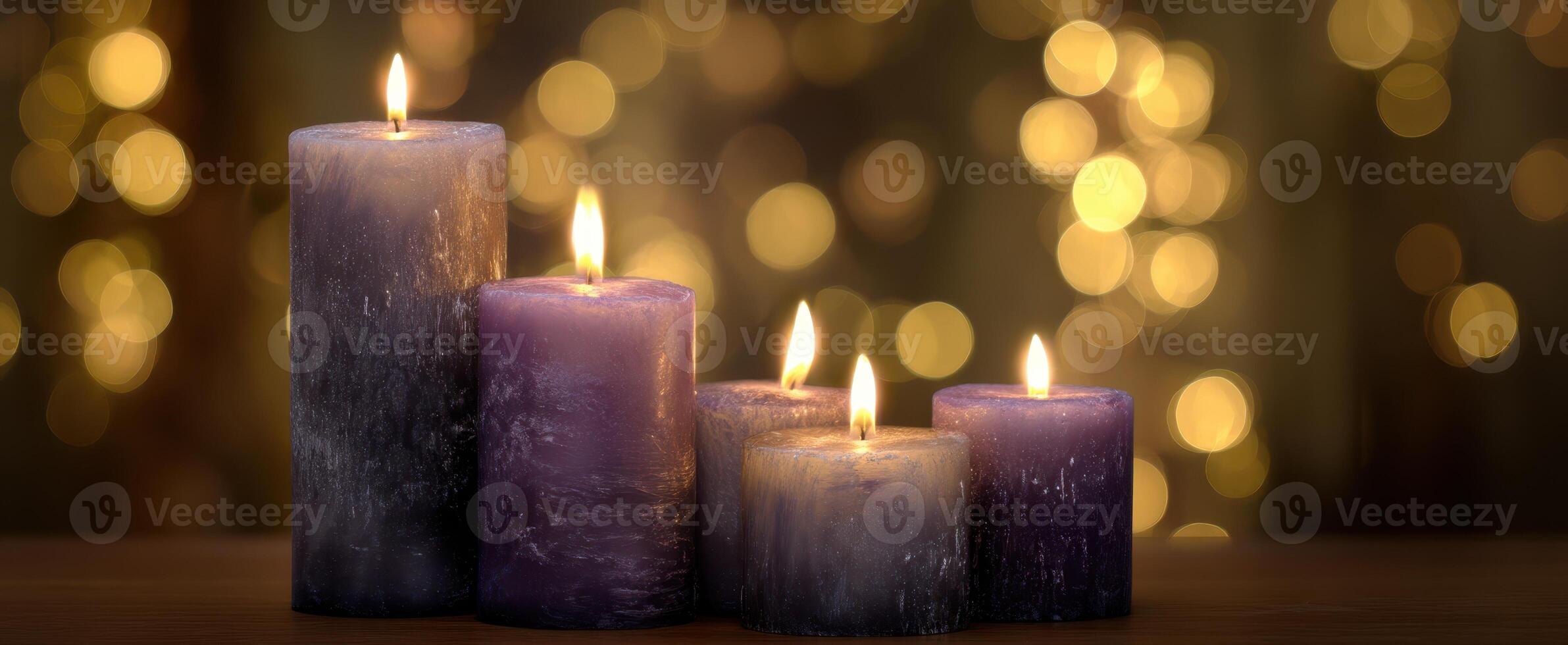 The Elegant Display of Purple Candles with Bokeh Background Lighting photo