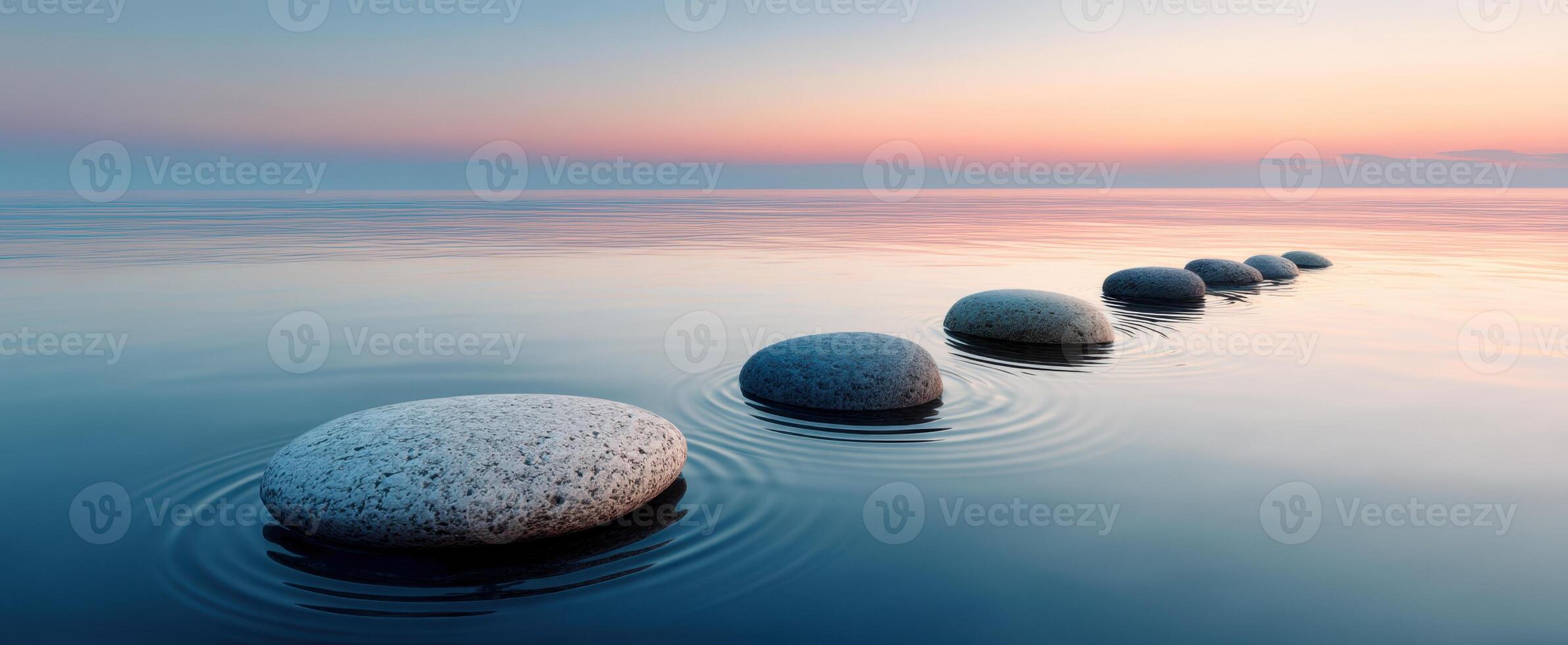 The serene journey of stones across calm water at sunset photo