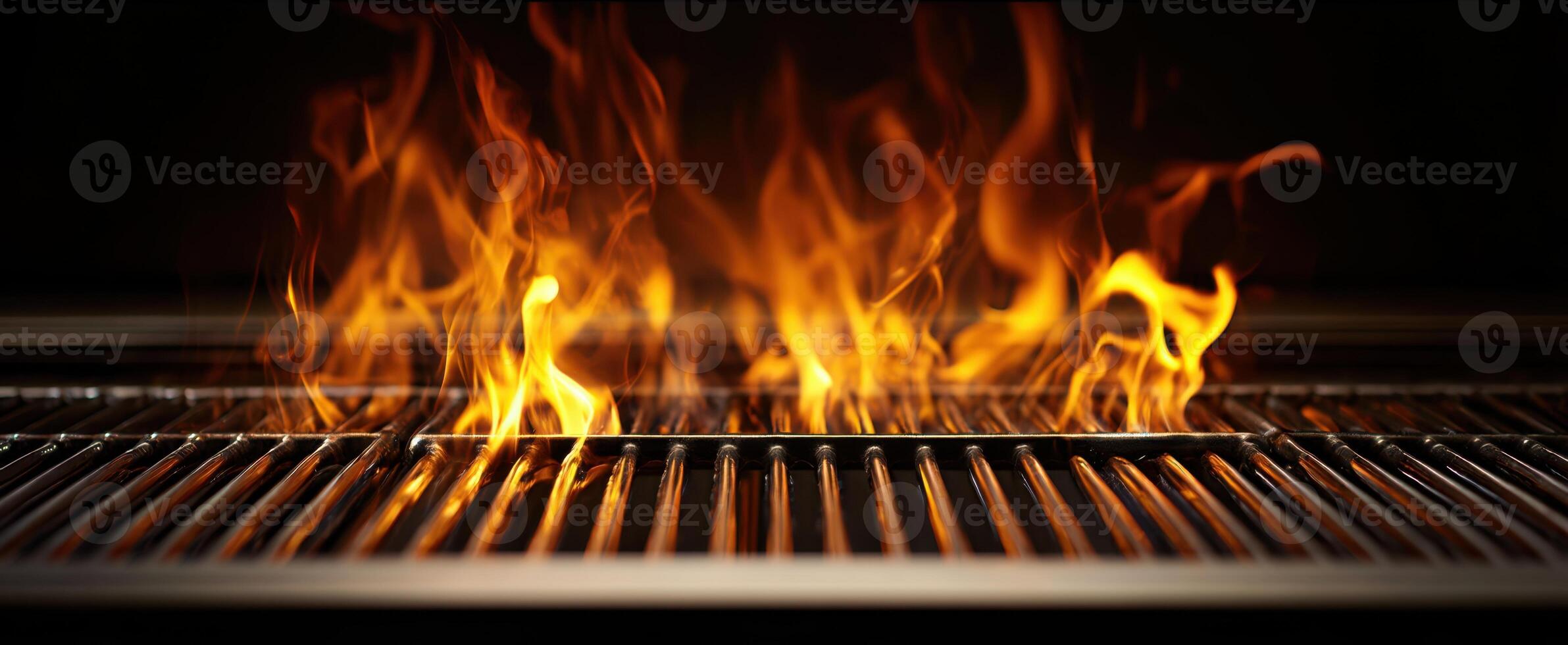 The vibrant flames dancing on a professional barbecue grill. photo