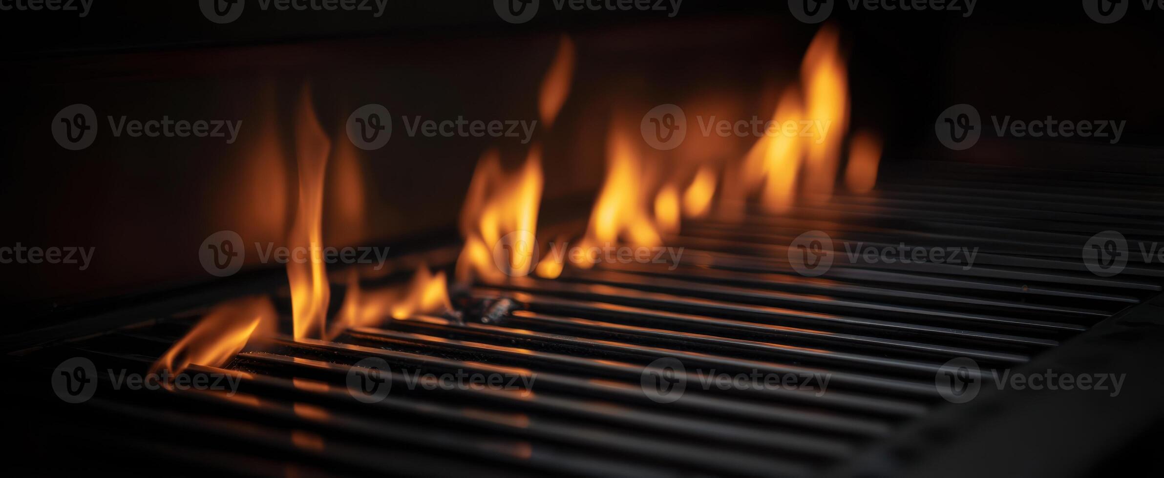 The Flames Dancing on a Grill Ready for Barbecuing Delicious Meals photo