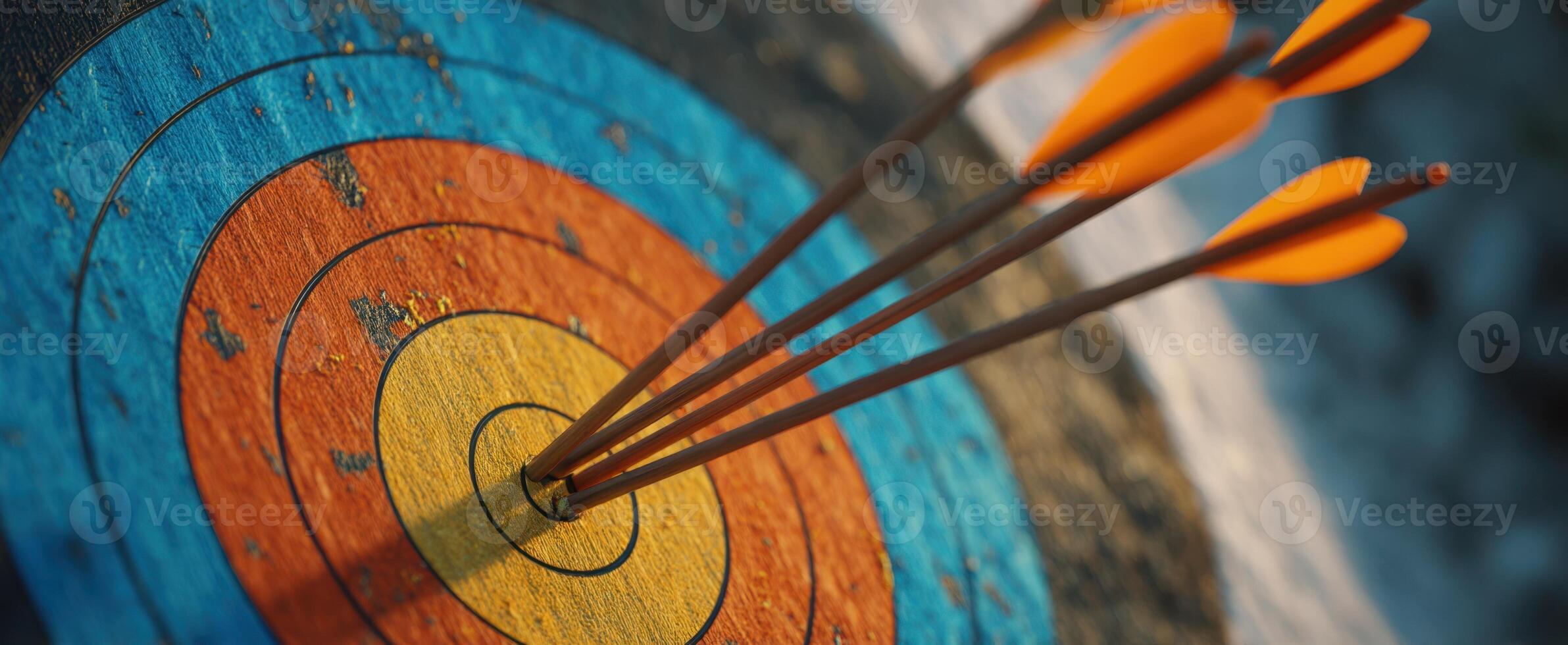 The target with arrows perfectly hitting the bullseye in vibrant colors. photo