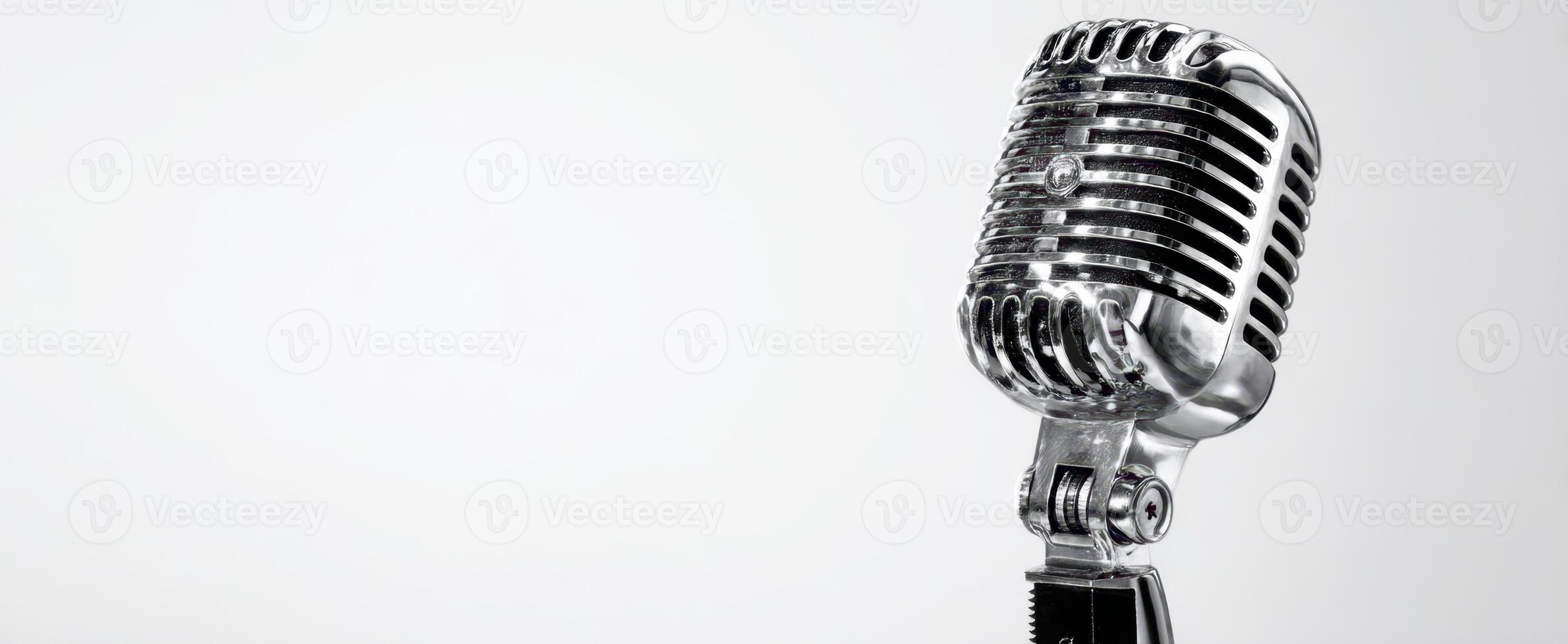 The vintage microphone standing elegantly on a simple background photo