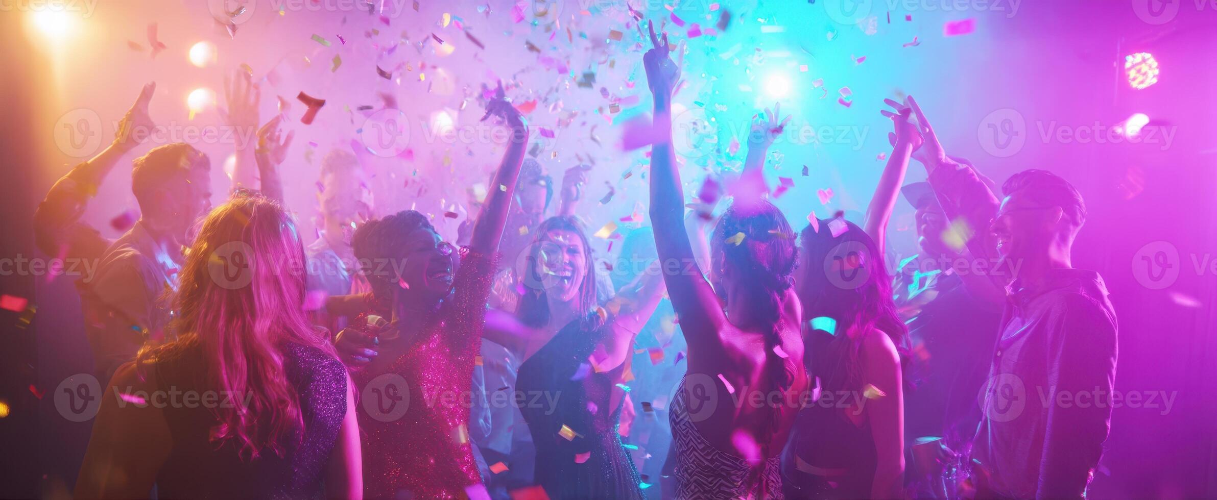 The lively atmosphere of a colorful party filled with dancing and joy. photo