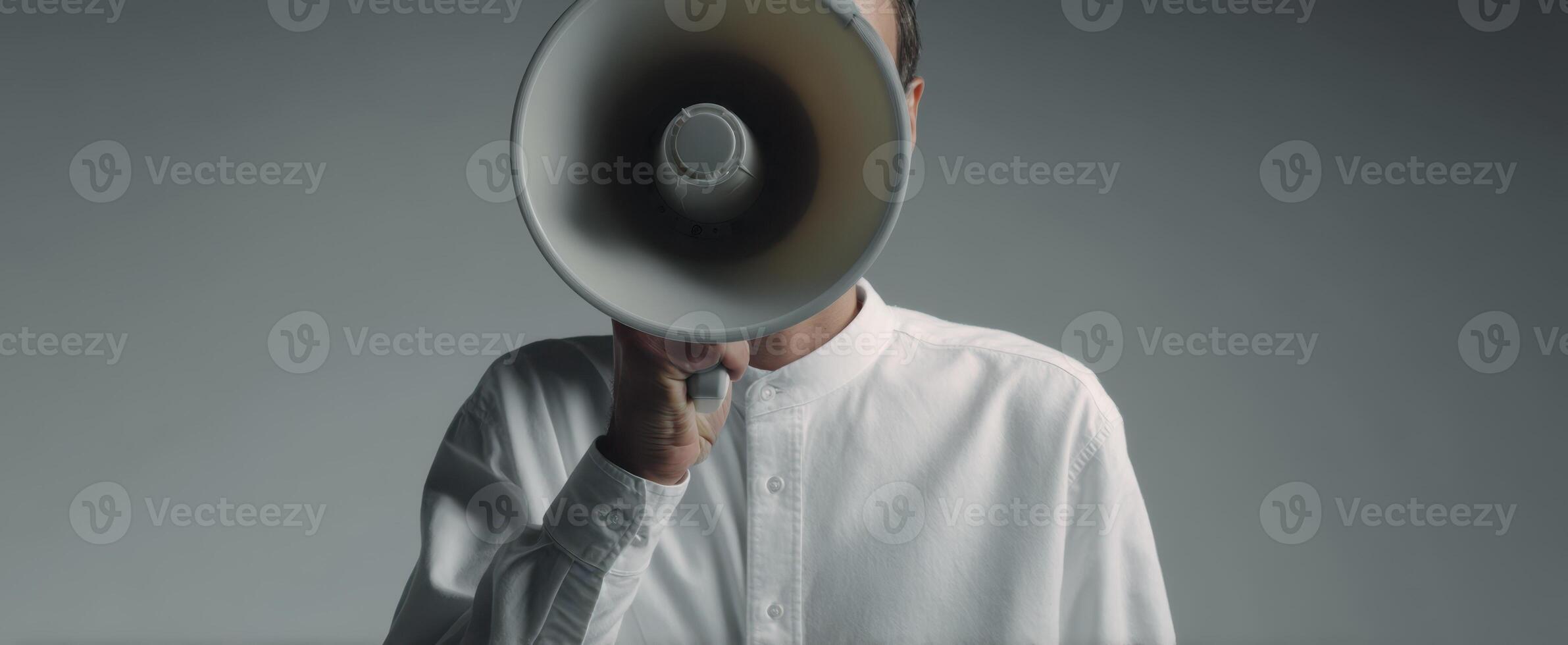 The man holding a megaphone conveying an important message in a minimalist style. photo