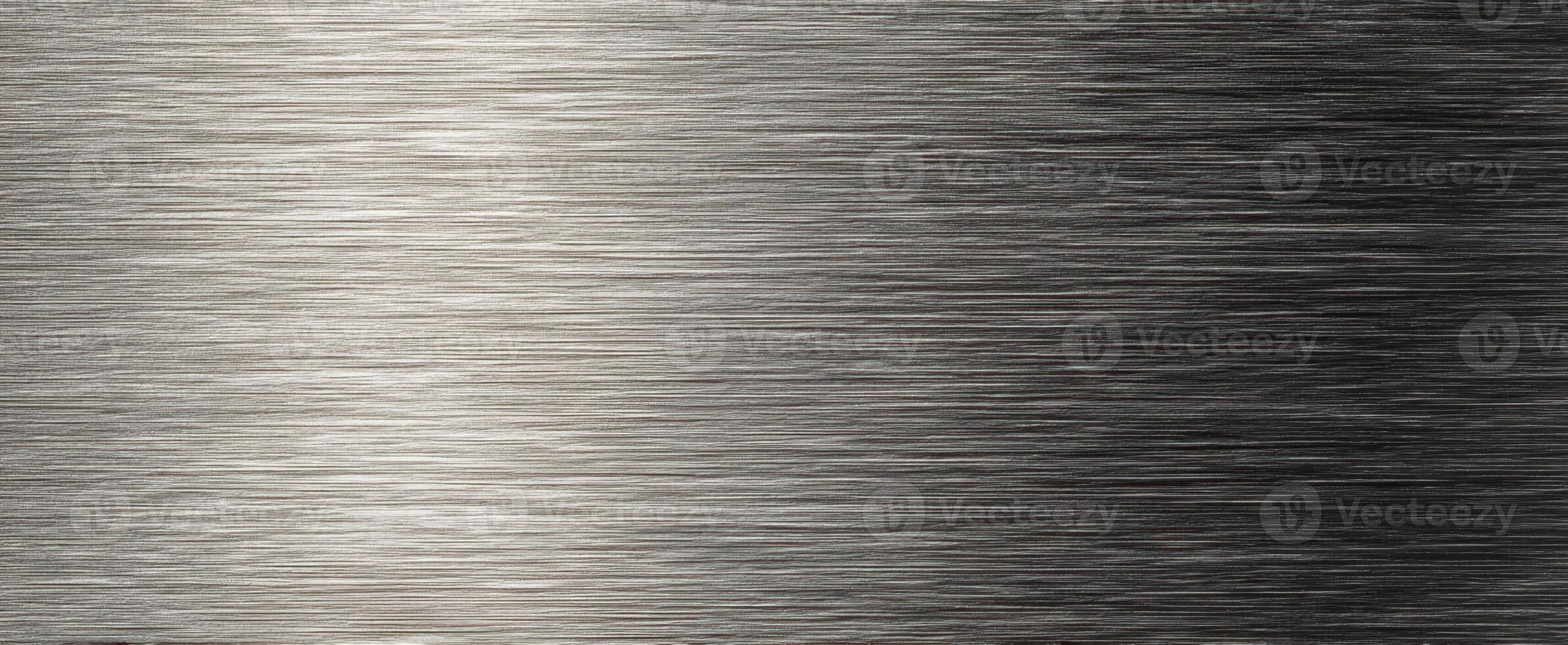 The brushed metal surface with a sleek and modern appearance. photo