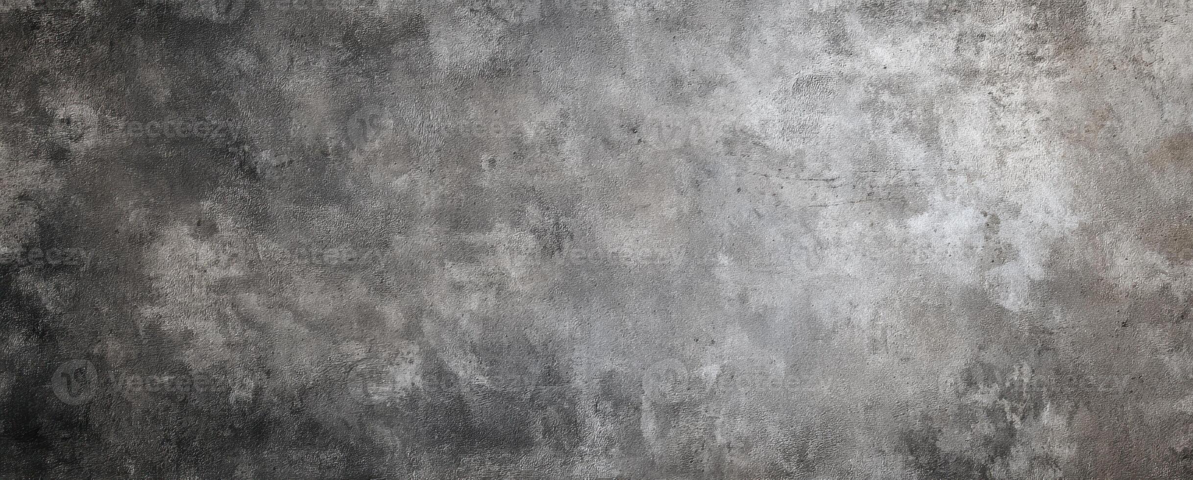 The textured gray concrete surface creating an abstract artistic backdrop for design. photo