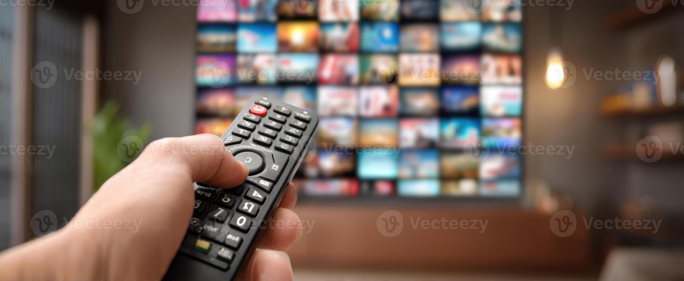 The remote control being used to navigate a vibrant television display. photo