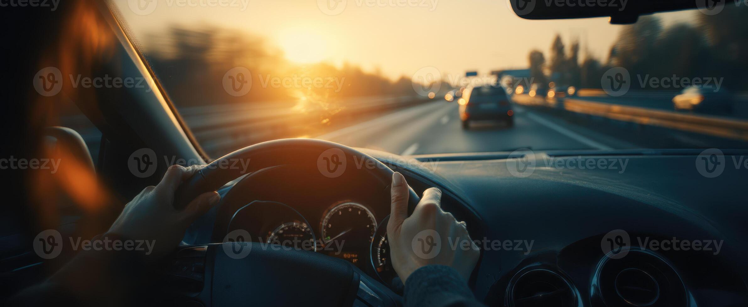 The serene drive captured during a stunning sunset on the highway. photo