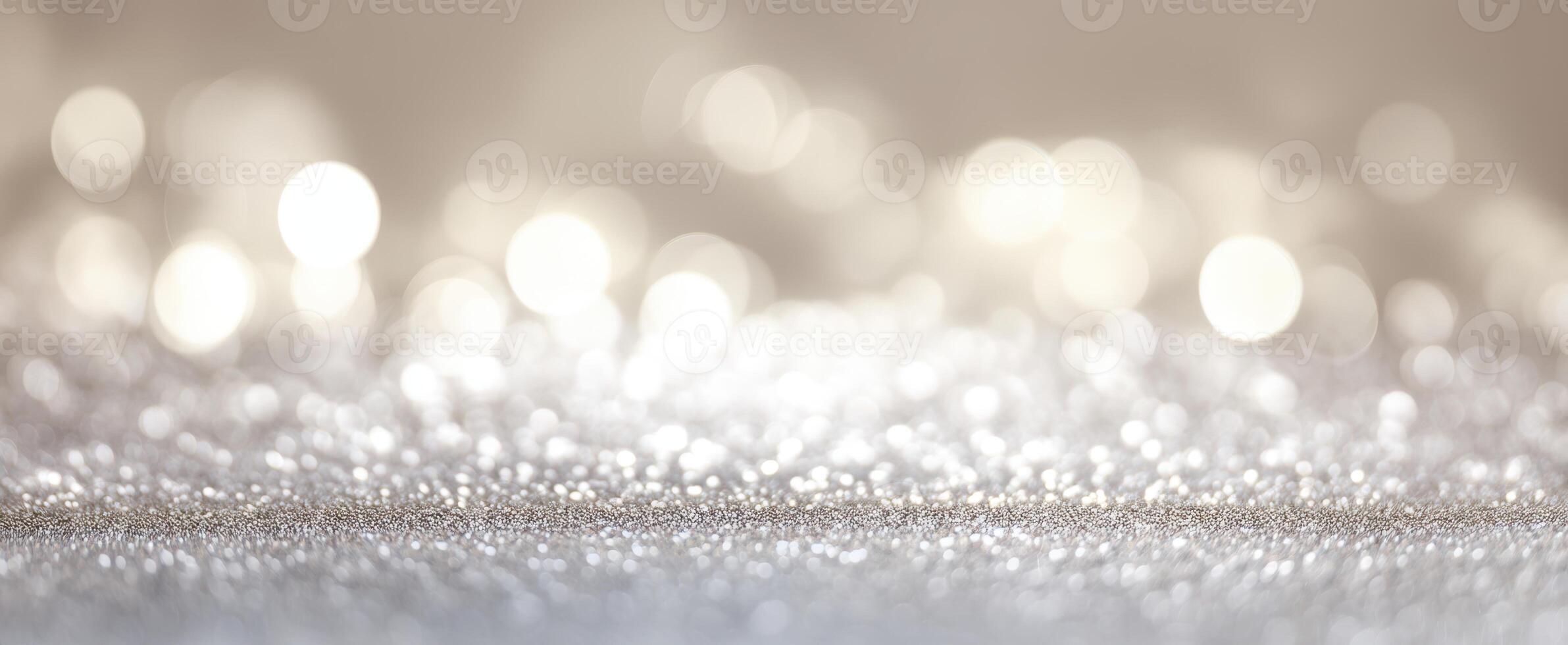The sparkling silver surface illuminated by beautiful bokeh lights. photo