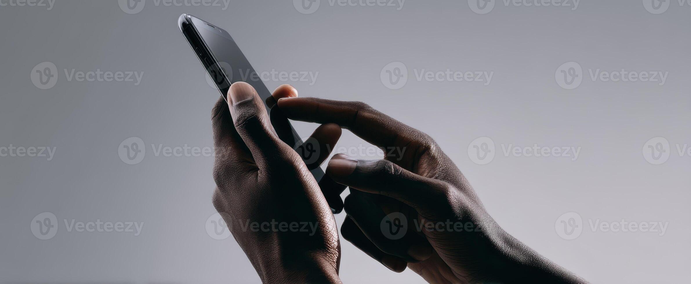 The Hands of a User Interacting with a Smartphone in a Modern Setting photo