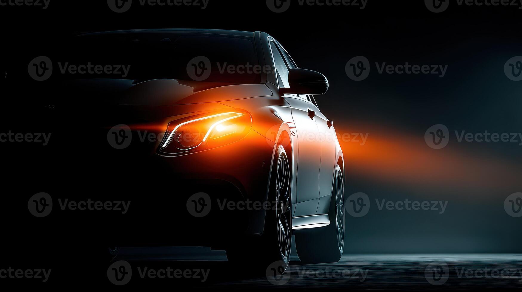 Sleek black car with glowing headlights under dramatic lighting at night photo