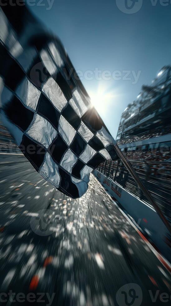 Checkered flag waves at the finish line signaling the end of an exciting race in a vibrant atmosphere photo