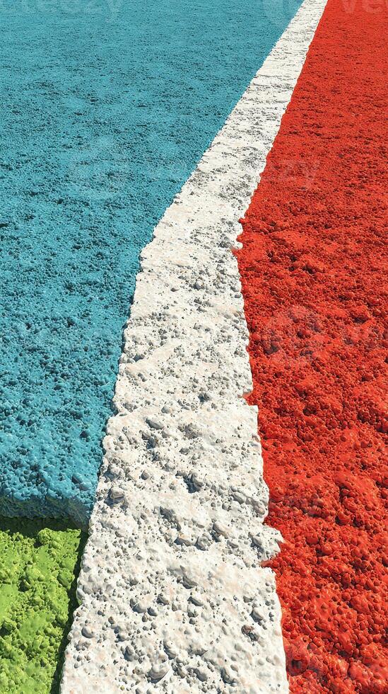 Vibrant basketball court with colorful lines and textured surface during daylight in an outdoor setting photo