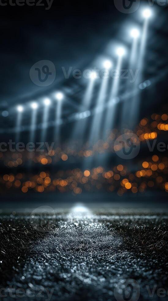 Stadium field illuminated by bright lights during a thrilling evening match photo