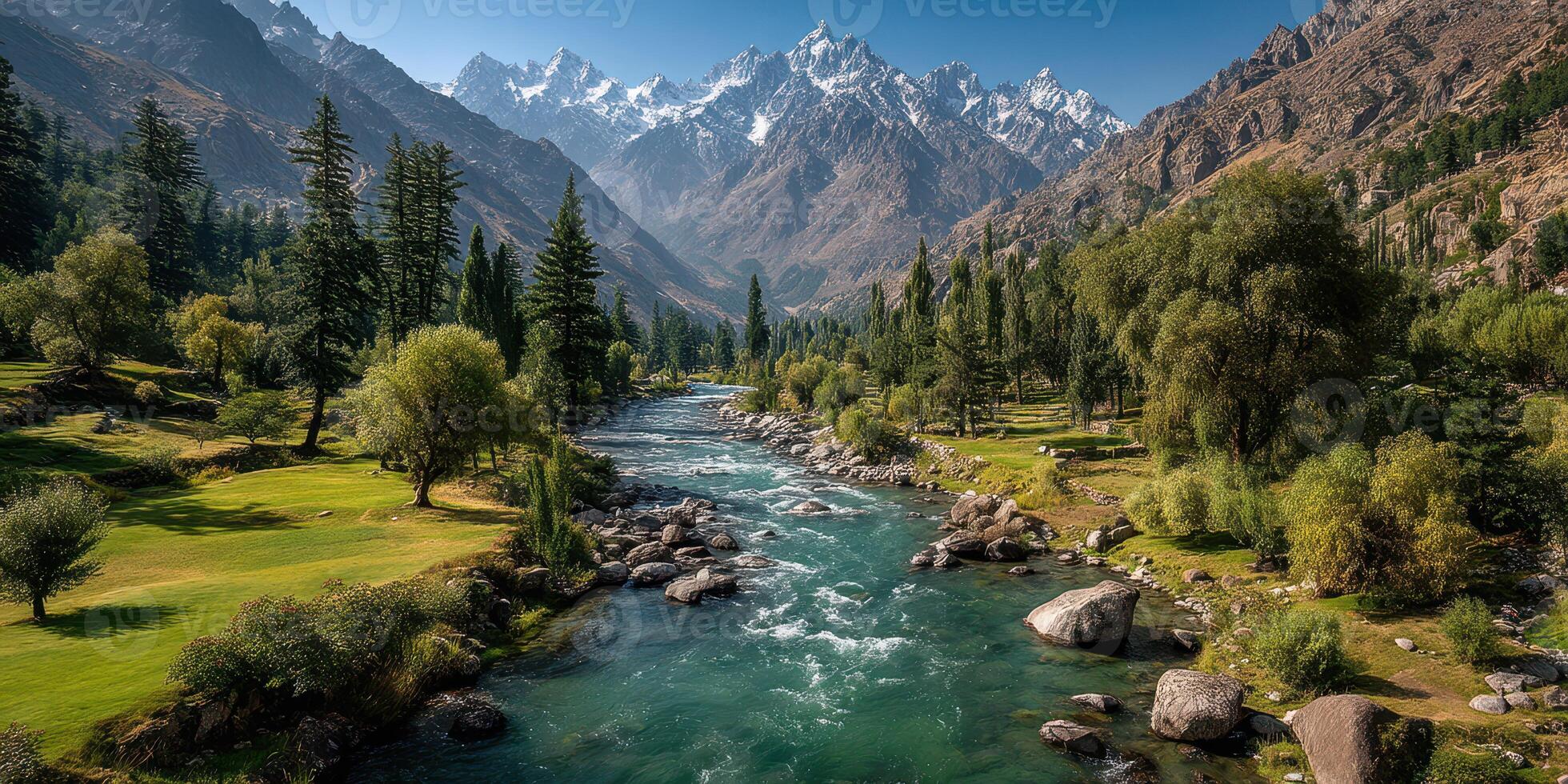 Stunning mountain landscape showcasing a clear river flowing through lush greenery in a picturesque valley photo