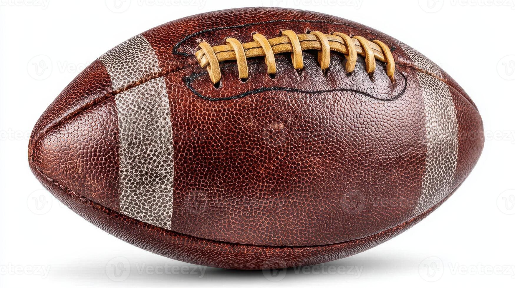 Vintage leather football resting on a surface with natural lighting showing its textured details and classic design photo