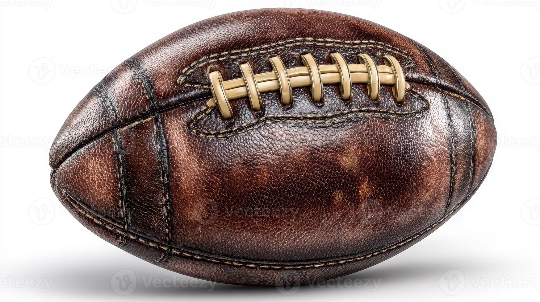 Vintage leather rugby ball resting on a clean surface in a well-lit indoor setting photo