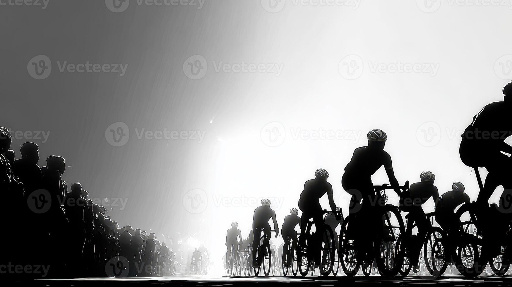 Cyclists competing in a race under a dramatic foggy atmosphere with enthusiastic spectators on the roadside photo