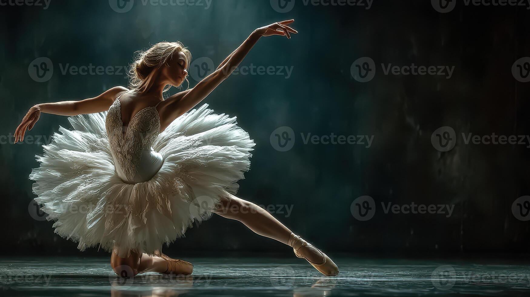 Graceful ballet dancer in a stunning pose during a performance in a dimly lit studio photo