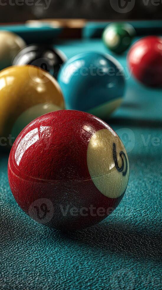 Colorful billiard balls on a green felt pool table highlighted by soft lighting in a cozy game room photo