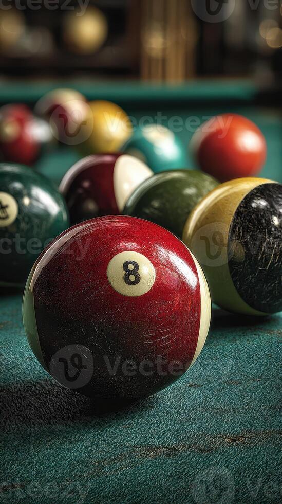 Eight ball and other billiard balls arranged on the green felt surface at a pool hall during an evening game photo