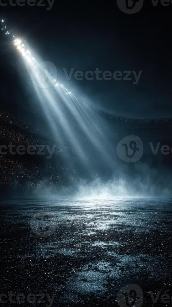 Stadium illuminated by dramatic lighting during an empty night event showcasing a haunting atmosphere photo