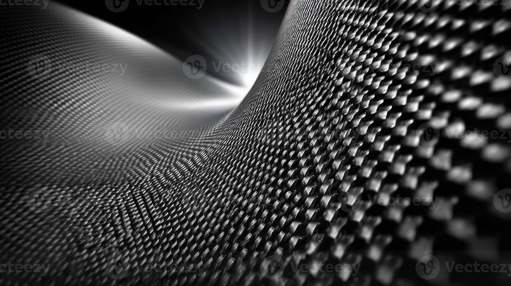 Texture of a black and white surface showcasing waves and geometric patterns in a dramatic light setting photo