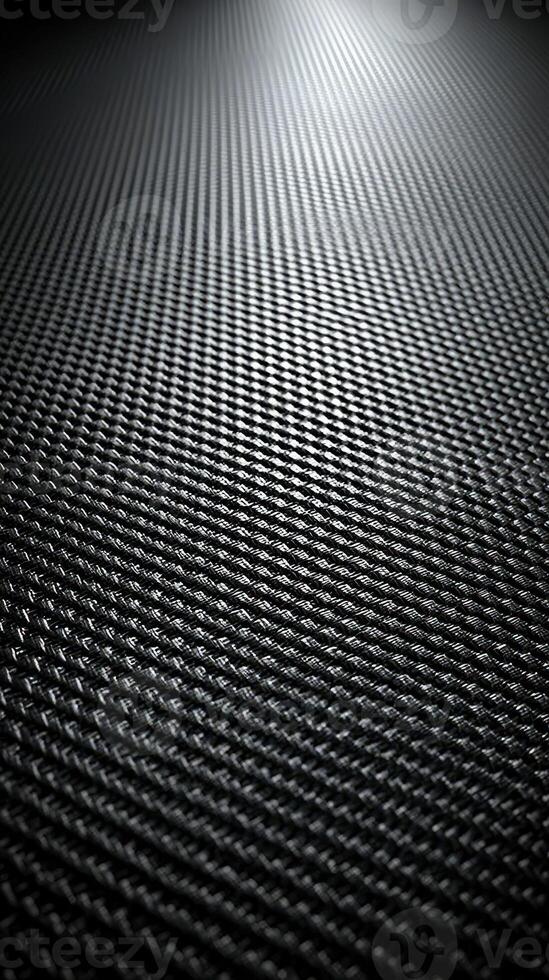 Textured surface of woven material reflecting light in a dimly lit environment at a close range photo