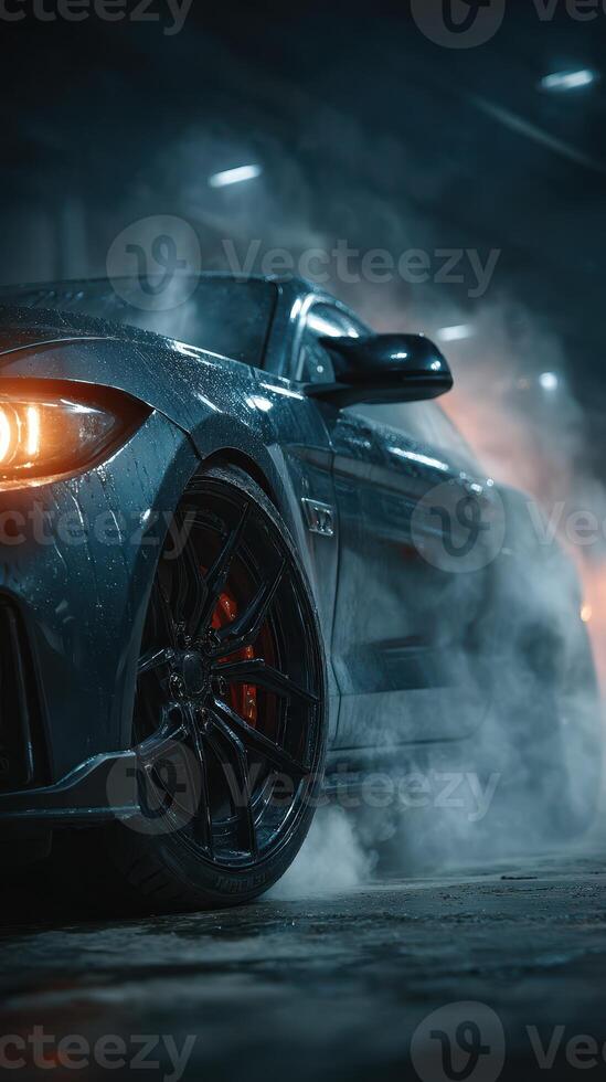 Powerful sports car emerges from smoke in a dimly lit garage photo