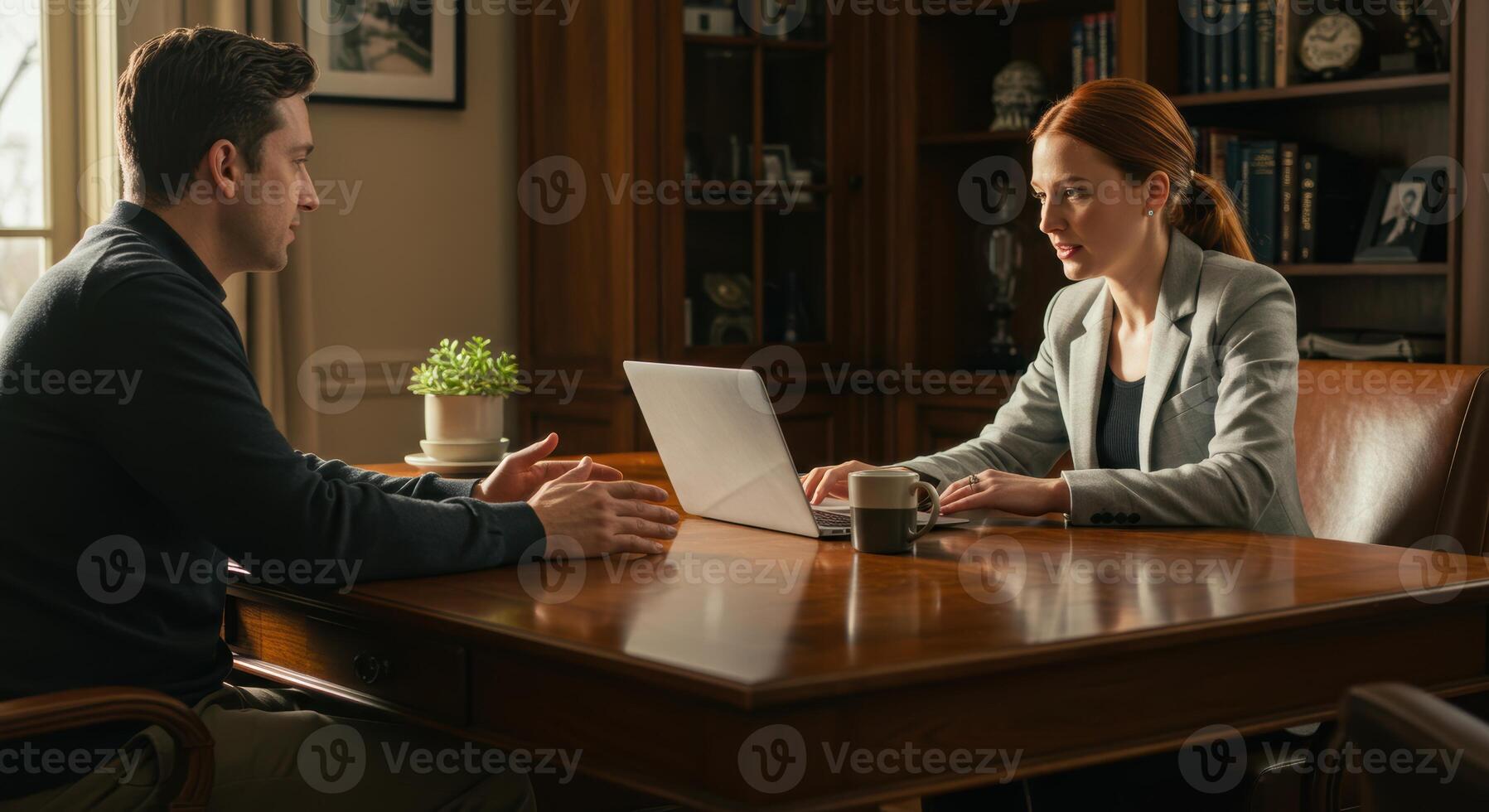 Business Meeting Between Woman and Man in Office photo