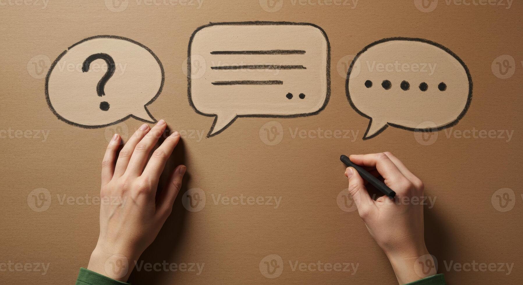 Hands drawing communication symbols speech bubbles question text dots photo