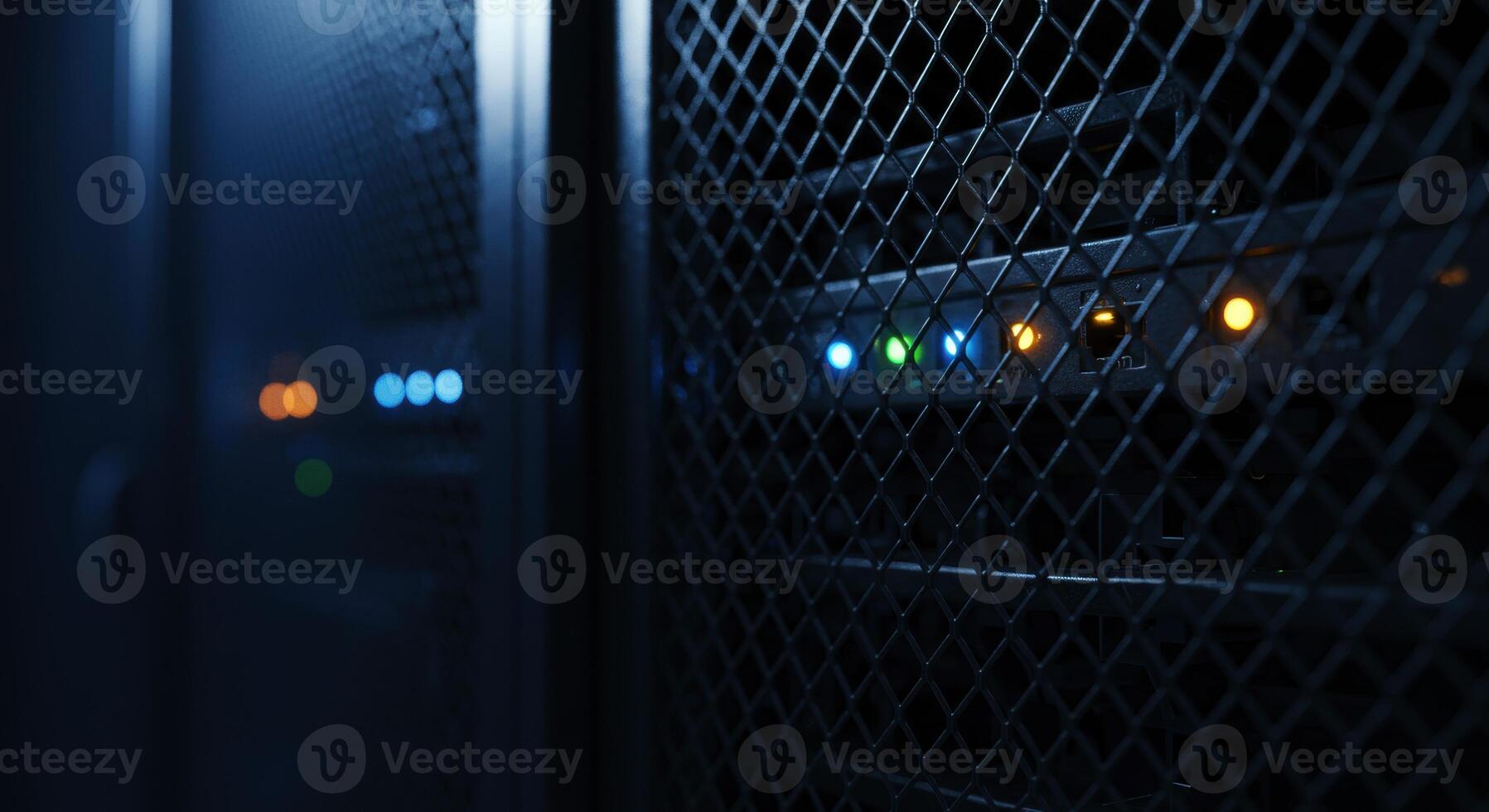 Close up of server rack mesh door with status lights glowing in a dark data center photo