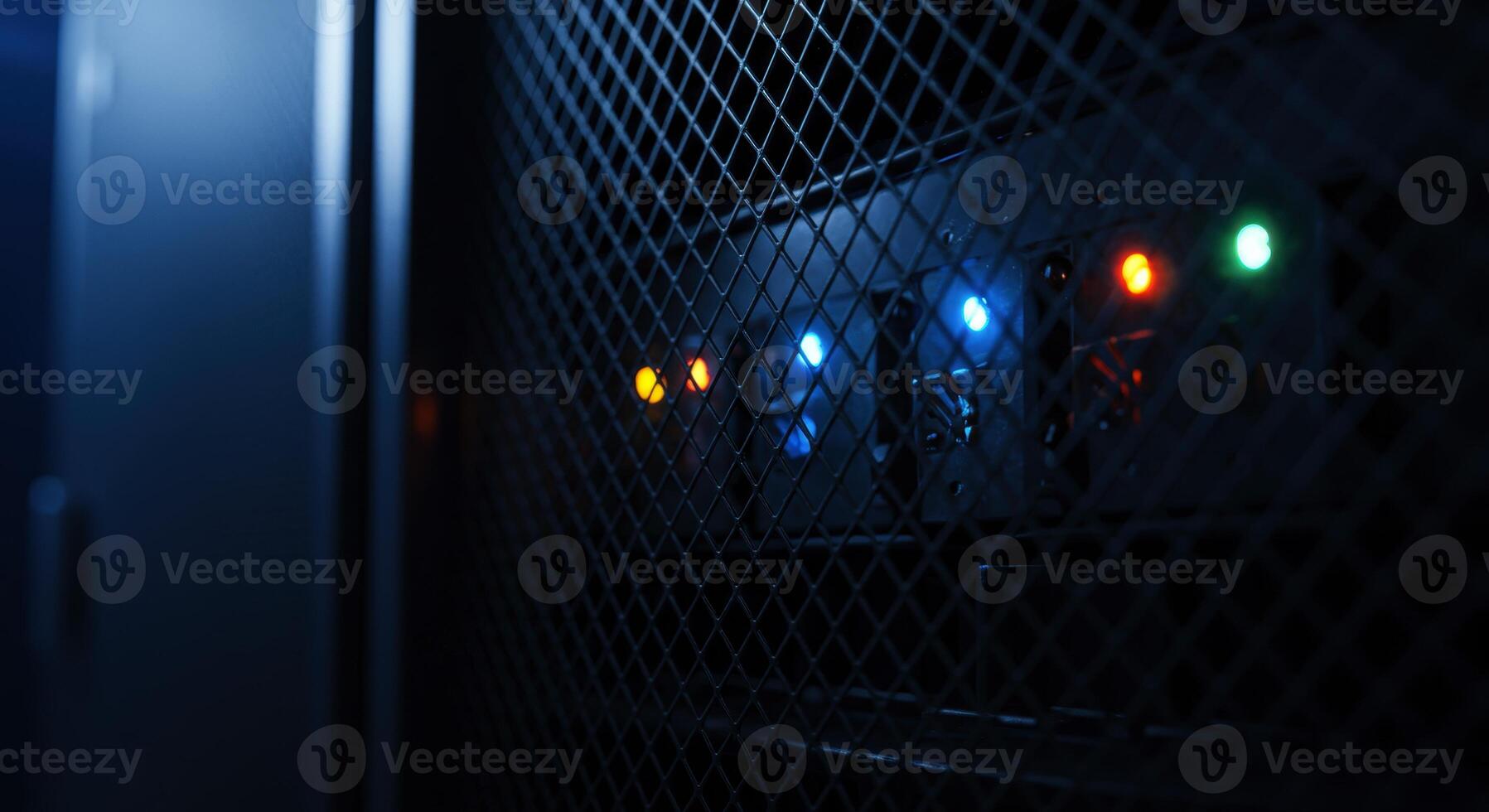 Close up of server rack mesh door with blinking status lights photo