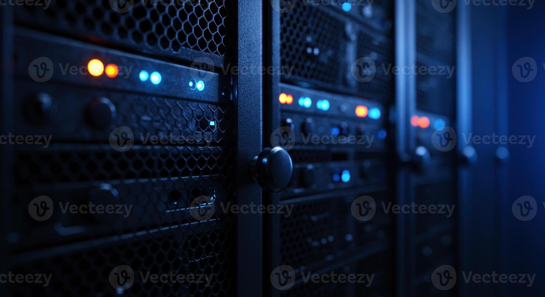 Close up view of server racks with lights in a dark data center photo