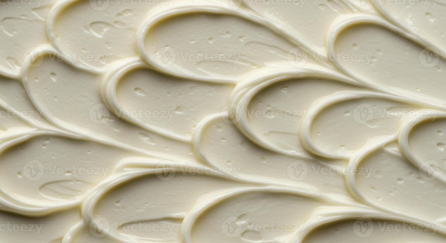 White cream texture with decorative wavy swirl pattern close up photo